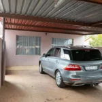 Covered carports inside the gate